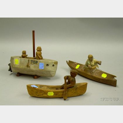 Folk Carved Wooden Eskimo in Kayak Figure, Man in Canoe Figure, and Figures in a Motor Boat