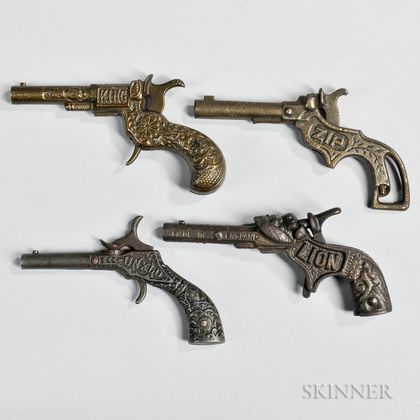 Four Small Cast Iron Toy Cap Guns