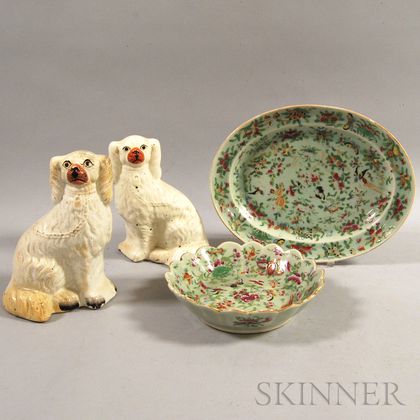 Two Famille Rose Porcelain Platters and a Pair of Staffordshire Spaniels. Estimate $200-250