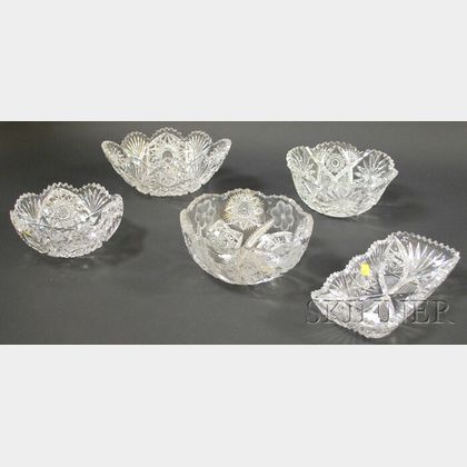 Four Colorless Cut Glass Bowls and a Tray