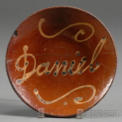 Redware Plate with Yellow Slip "Daniel" Inscription