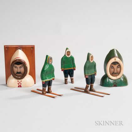Three Carved and Painted Eskimo Figures