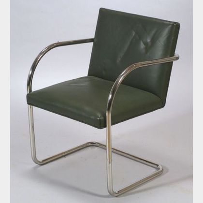 One Mies van der Rohe BRNO Leather Upholstered Bent Steel Armchair.