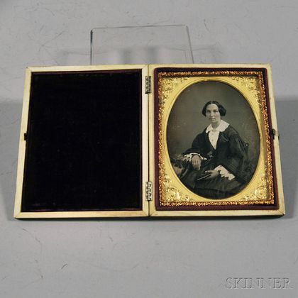 Quarter-plate Daguerreotype Portrait of a Woman Holding a Cased Photograph