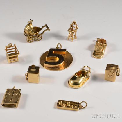 Nine 14kt Gold Child-themed Charms
