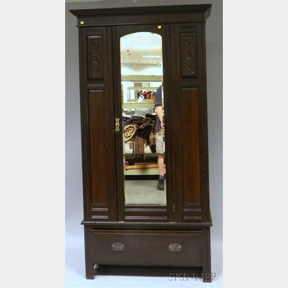 Late Victorian Walnut-finished Carved Wood and Mirrored Armoire with Long Drawer. 