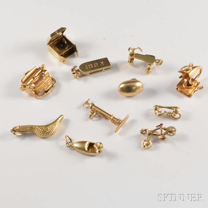 Eleven 14kt Gold Leisure-themed Figural Charms
