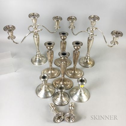Nine Sterling Silver Weighted Candlesticks