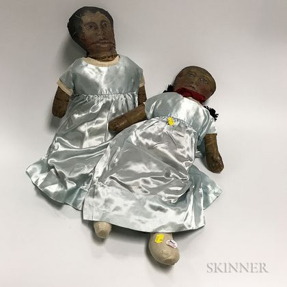 Two Painted Oil Cloth Dolls