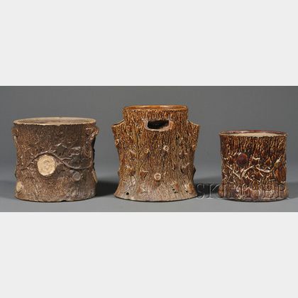 Three Rockingham Glazed Pewtress Pottery Tree Stump-form Planters