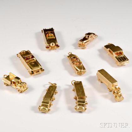 Nine 14kt Gold Automobile Charms