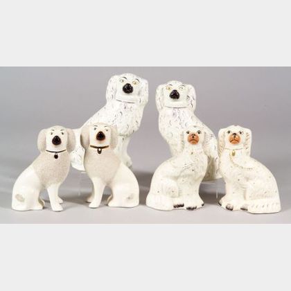 Three Pairs of Staffordshire Pottery Dogs