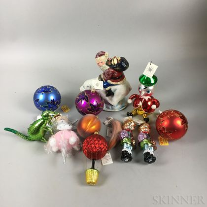 Extensive Collection of Mostly Christopher Radko Glass Christmas Ornaments. Estimate $20-200