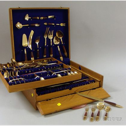 150-piece Cased Thai Brass and Hardwood-mounted Flatware Set. 