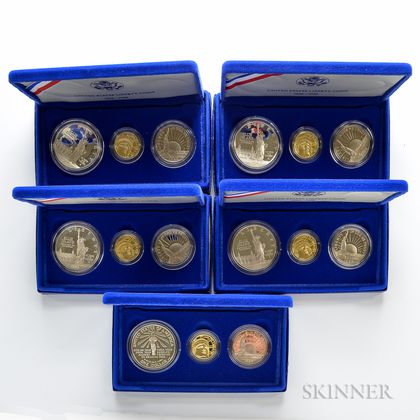 Five 1986 Liberty Gold and Silver Three-coin Proof Sets. Estimate $1,000-1,200