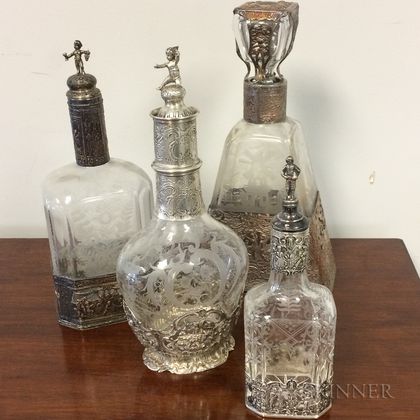Four German Cut Glass and Silver Overlay Decanters