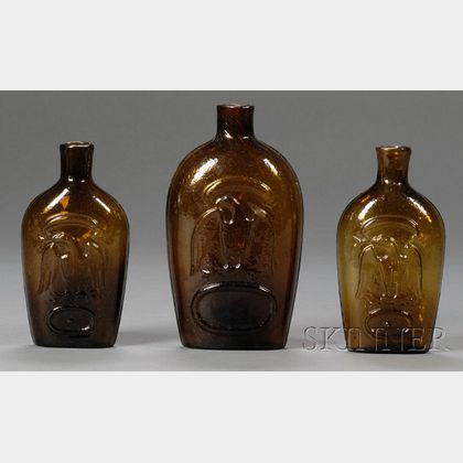 Three Amber Blown Molded Historical Eagle Glass Flasks