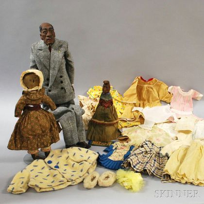 Three African-American Dolls and Miscellaneous Doll Clothing