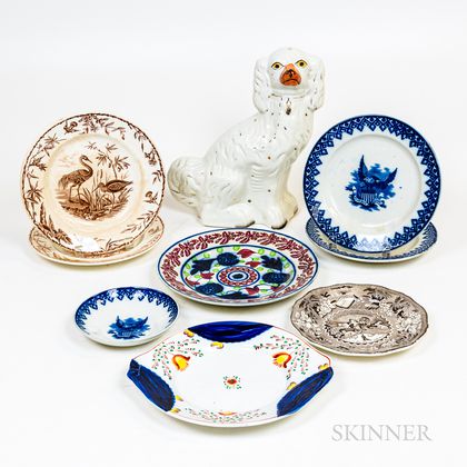 Eight Transfer-decorated Plates and a Staffordshire Spaniel