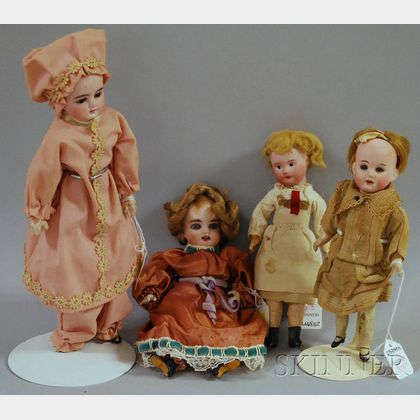 Four Small Bisque Head Dolls