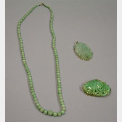 Jade Bead Necklace and a Carved Jade Pendant and Brooch. 