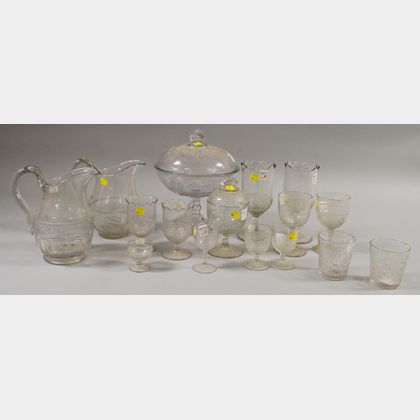 Sixteen Pieces of Colorless Pressed Holly Pattern Glass Tableware