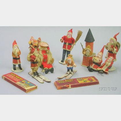 Thirteen Cloth and Composition Santas and Related Items