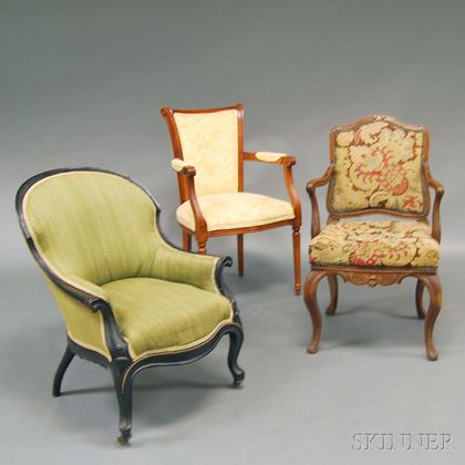 Three Carved and Upholstered Armchairs