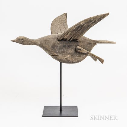 Carved Figure of a Duck in Flight