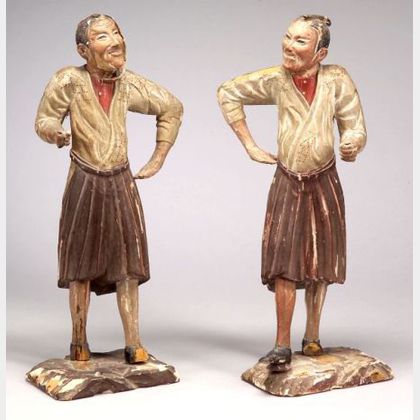 Pair of Carved Wooden Candleholders