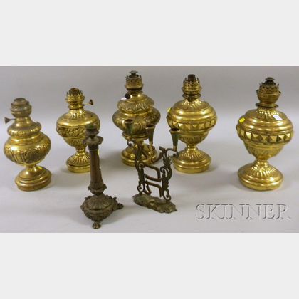 Five Brass Kerosene Table Lamps, a Bronze Candlestick, and an Israeli Brass Candelabra. 