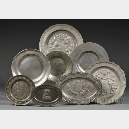 Eight Pewter Plates and Chargers