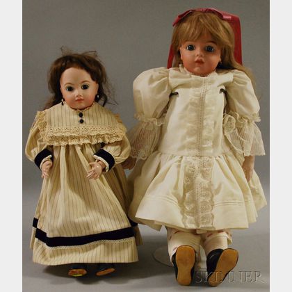 Two Reproduction French Bisque Head Dolls