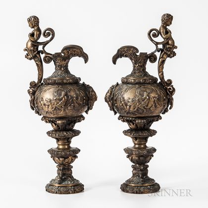 Pair of Mythological Decorated Bronze Ewers