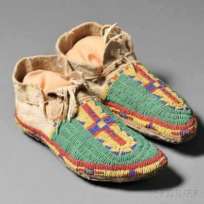 Sold at auction Pair of Lakota Beaded Buffalo Hide Moccasins Auction ...