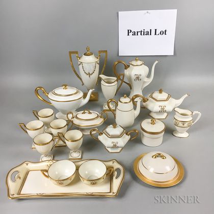 Thirty-two Pieces of Lenox Gold Band Porcelain Tableware. Estimate $20-200