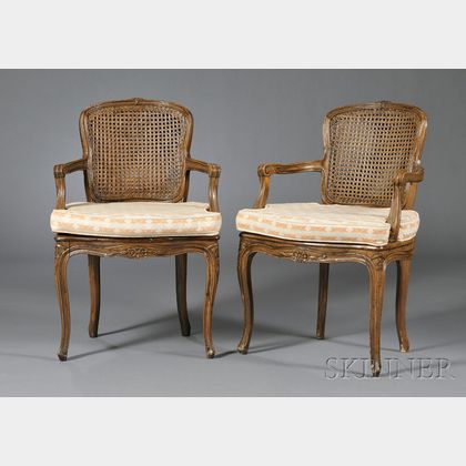 Pair of Louis XV Style Beechwood and Caned Open Armchairs
