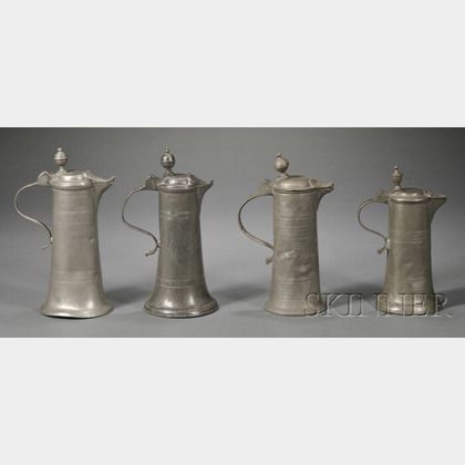 Four Trumpet-shaped Pewter Flagons