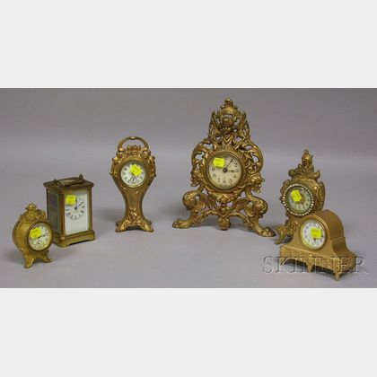 Collection of Six Brass and Spelter Case Clocks