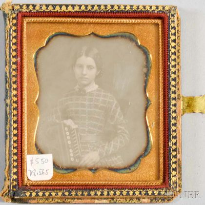 Cased Sixth-plate Daguerreotype of a Girl with a Concertina. Estimate $200-300