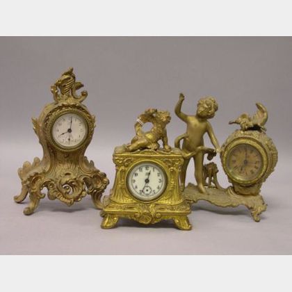 Three Rococo-style Gilt Cast Metal Timepieces