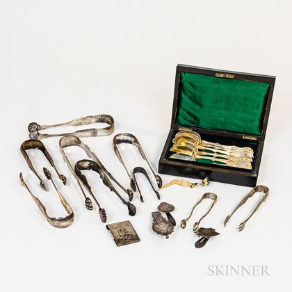 Group of Coin Silver Tongs, a Cased Vermeil Set of Demitasse Spoons, and Belt Buckles. Estimate $300-500