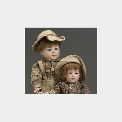 Pair of Heubach Glass-Eyed Pouty Children