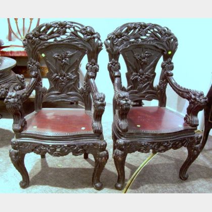 Pair of Asian Ebonized Carved Hardwood Armchairs. 