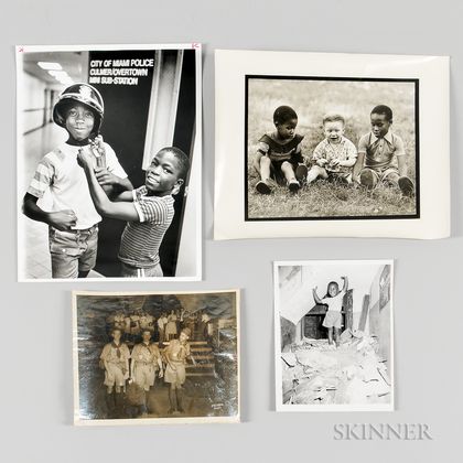 Four Photographs of African American Children. Estimate $150-250