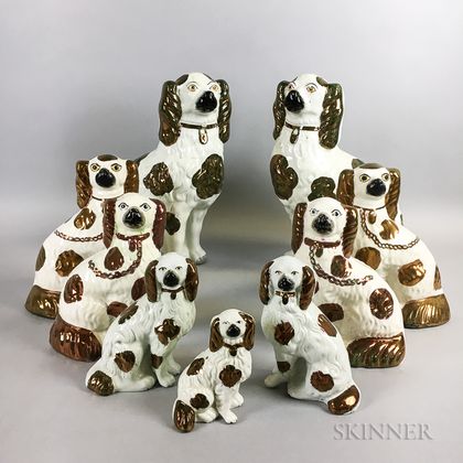 Nine Staffordshire Ceramic Spaniels with Lustre Accents