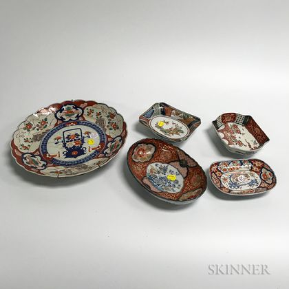 Twenty Pieces of Mostly Imari Porcelain. Estimate $400-600
