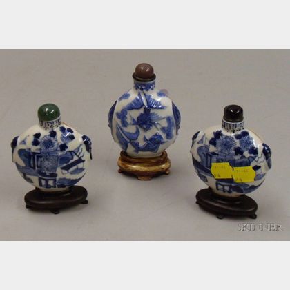 Three Blue and White Snuff Bottles on Stands