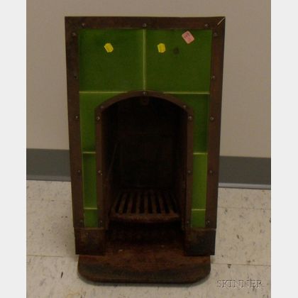 Diminutive Simpson Lawrence & Co. Cast Iron Coal Stove with Copper Framed Green Glazed Pottery Tile Facade