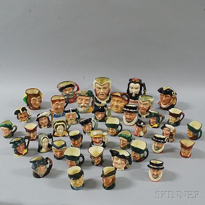 Forty Doulton Face Jugs